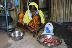 poor woman make food of meat
